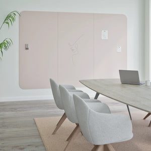 Minimal meeting room with gray chairs, wood table, Chameleon Curve Wall Frameless VES Magnetic Whiteboard, and laptop.