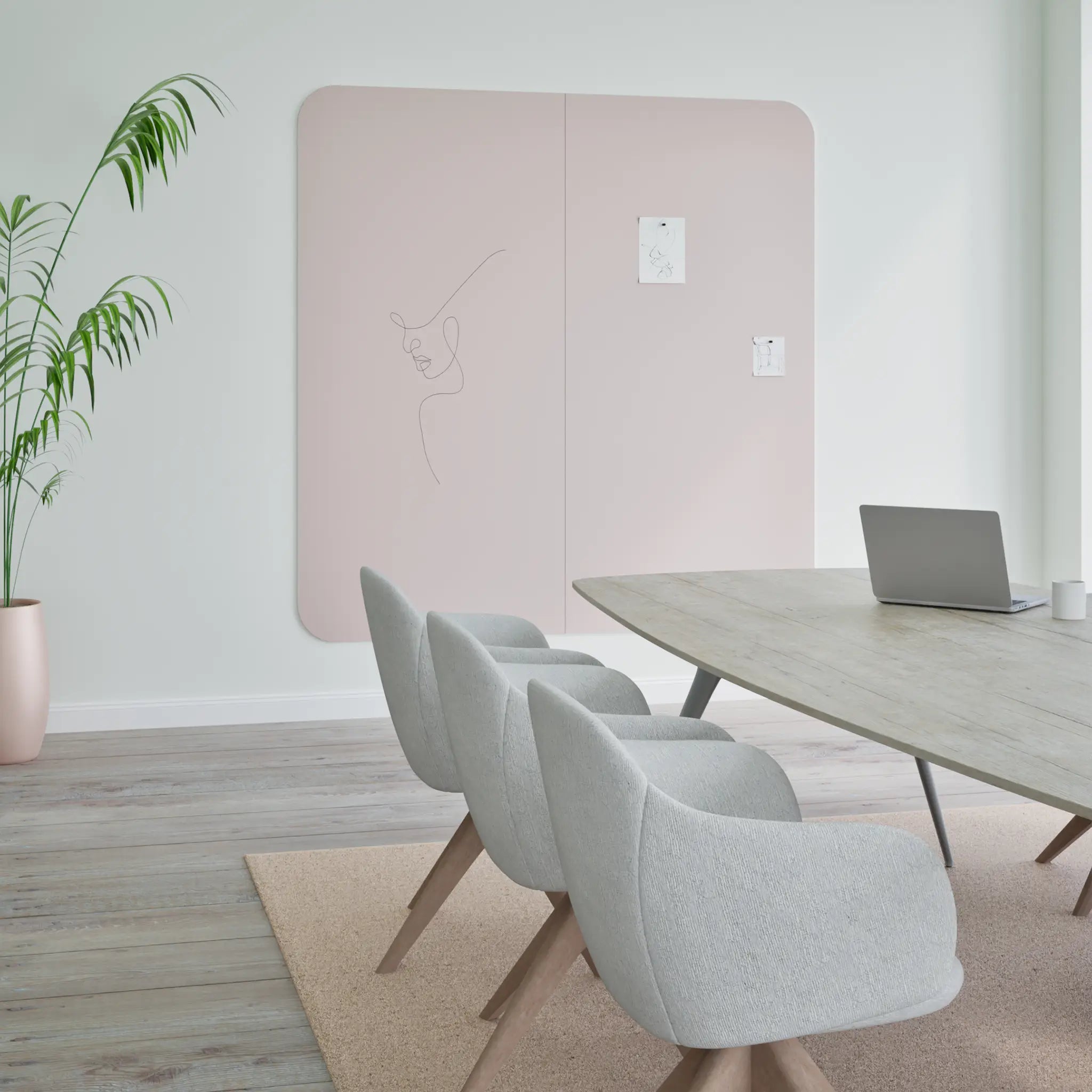 Showcasing a modern office with Chameleon Curve Frameless VES Magnetic Whiteboard, wood table, gray chairs & stylish decor.