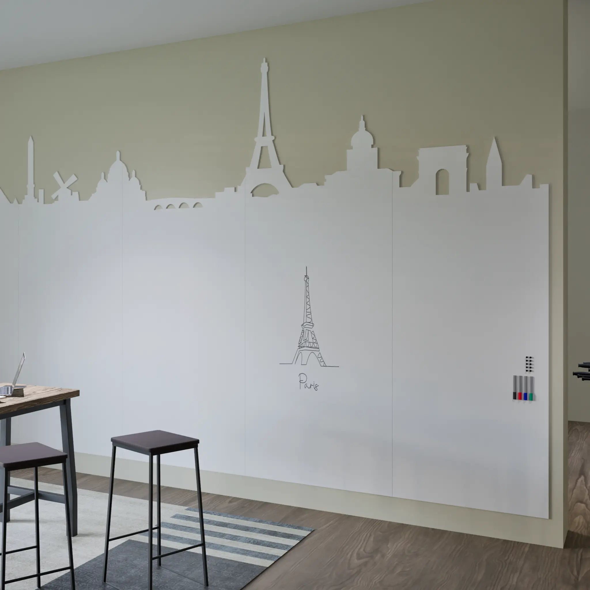 Boost creativity with the Chameleon Custom Whiteboard Wall, Paris cutouts, Eiffel Tower art, colored markers, stools and table.