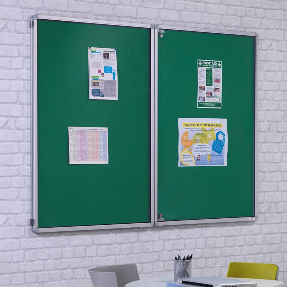 Fire-resistant green tamperproof notice board by Presentation Spaces, compliant with UK regs, wall-mounted, holds four papers.