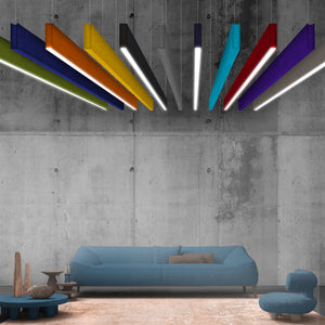 Showcasing Zen Light Baffle by Zen Zone, this modern living room with blue sofa uses colorful acoustic lighting for style and echo control.