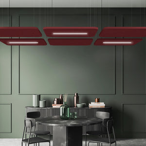 Contemporary dining room with dark green walls, round table, black chairs, vases, and Zen Light Raft maroon acoustic ceiling panels.