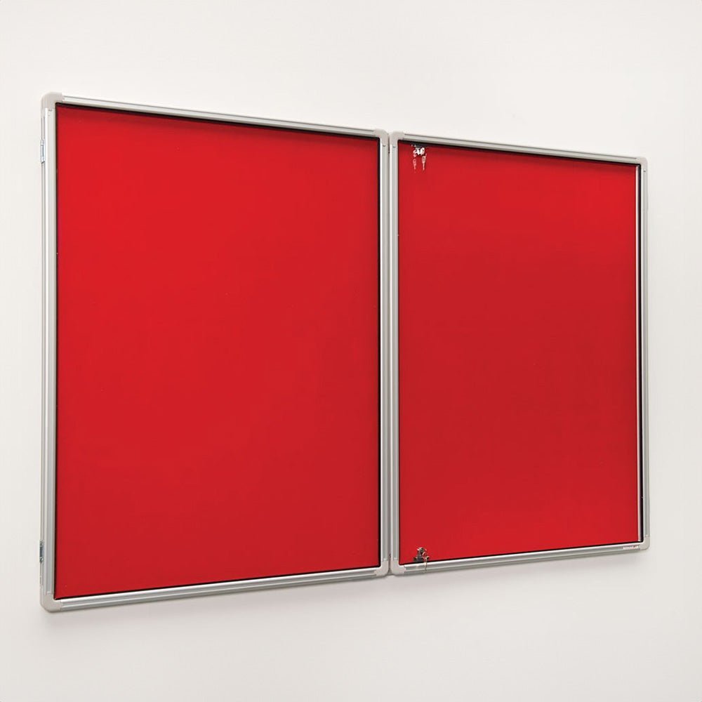Red Premier Felt Tamperproof Fire Retardant Aluminium Frame notice boards with locking doors by Presentation Spaces on white wall.
