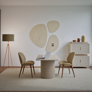Minimalist office with Chameleon Pebbles magnetic whiteboard, beige chairs, round table, abstract art, and neutral decor.