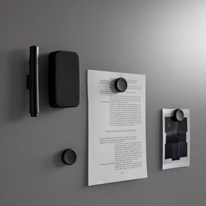 Discover the Lintex Silk Wall: a sleek, gray magnetic board with pen, case, paper, photo, and stylish black magnets on display.