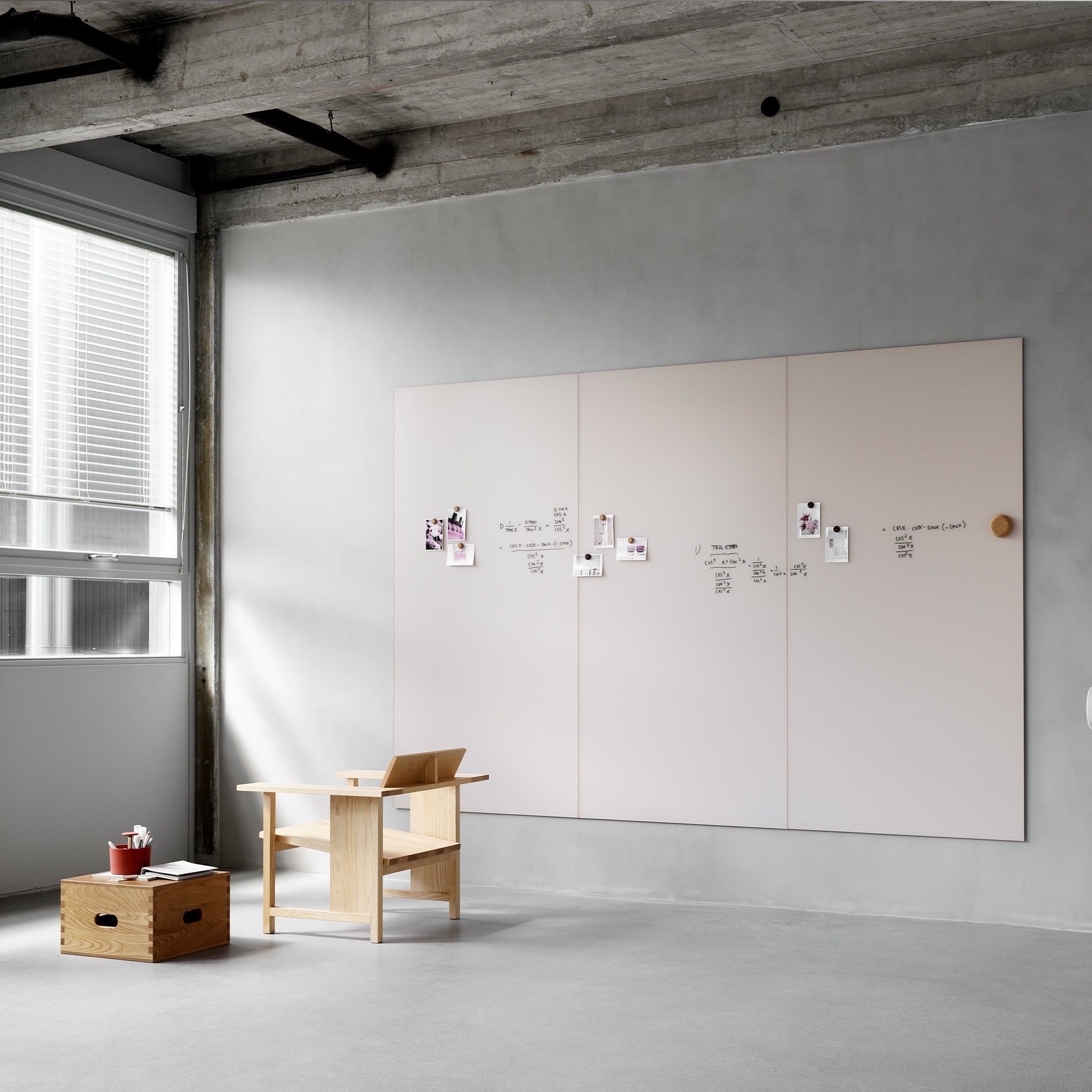Discover a minimalist office featuring a Lintex Silk Wall magnetic board, wood furniture, and natural light—perfect for productivity.
