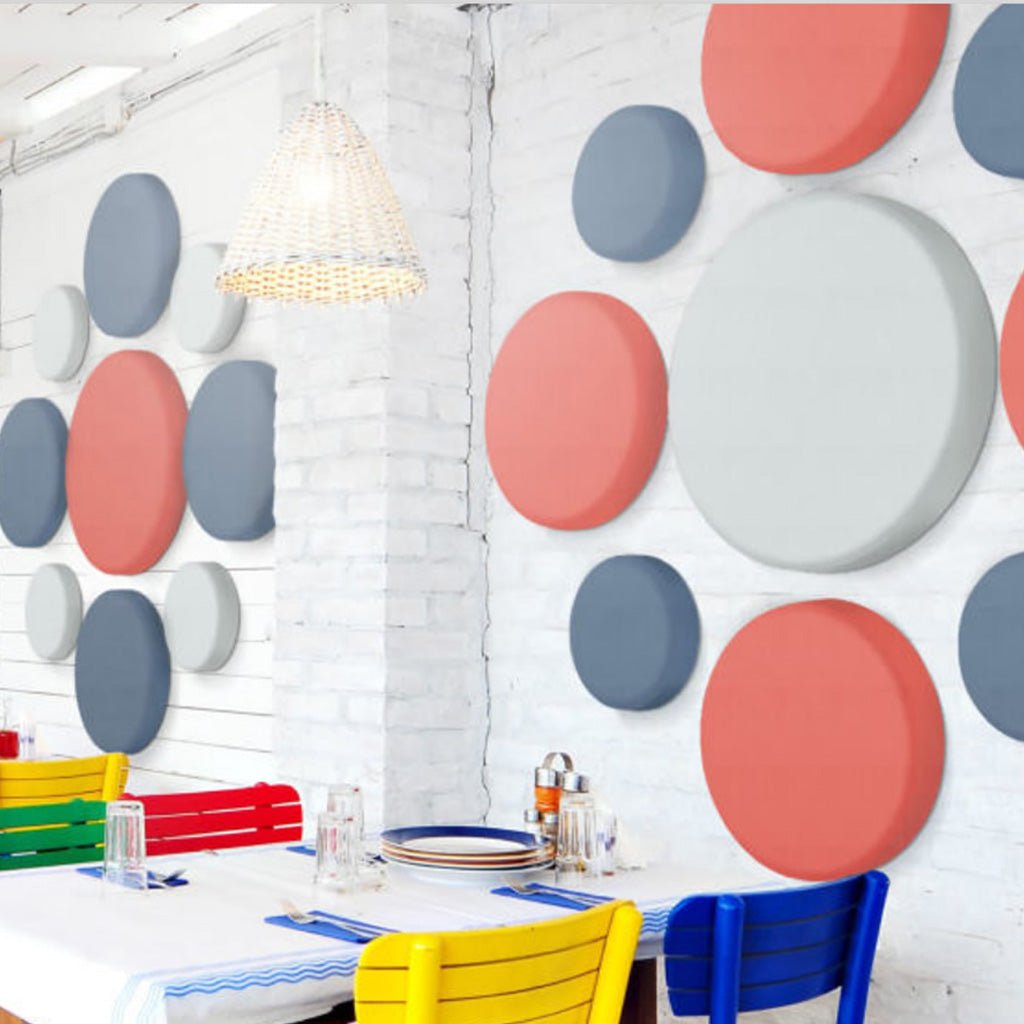 Discover Zen Zone’s Zen Pearl: a bright cafe with white brick walls, vibrant wall panels, and colorful chairs for lively dining.