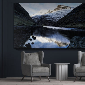 Showcasing Zen Zone’s Zen Photo: a sound-absorbing mountain art panel in a stylish gray room with modern armchairs and table.