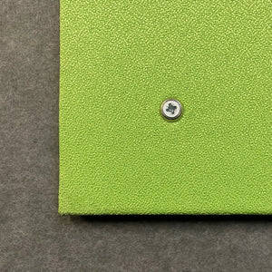 Robust green notice board (Class B Fire Rated, UK-made) with central silver screw, ideal for global high-risk workplace safety.