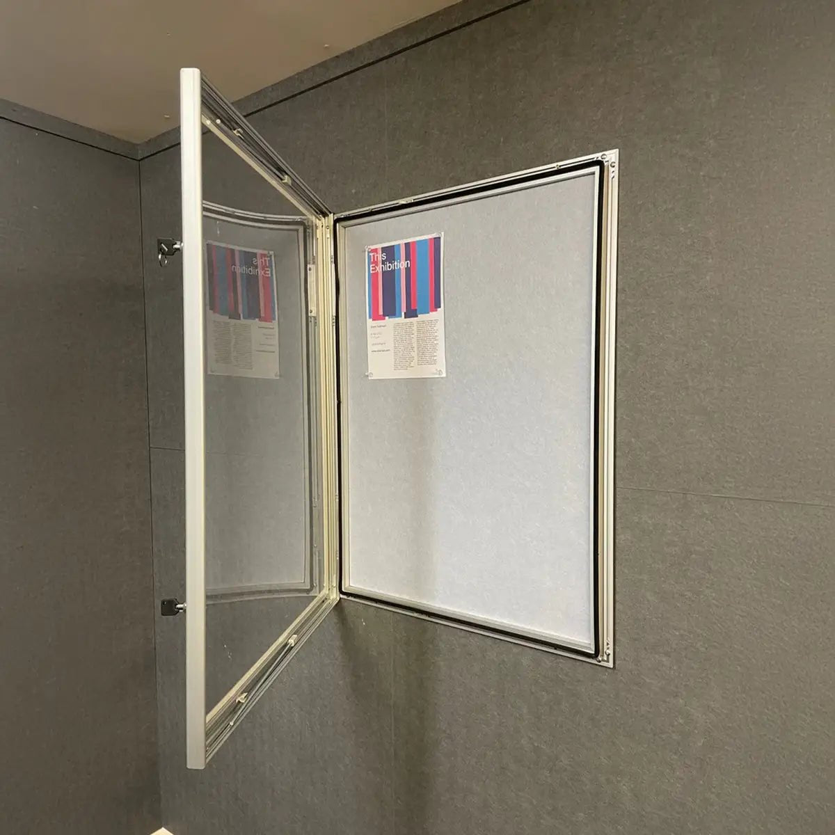 Presentation Spaces Weatherproof Wall-Mounted Noticeboard (Silver) open, displaying a safety notice—ideal for global insurer offices.